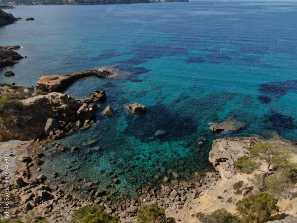 Beautiful view of the seacoast of Majorca with an amazing turquoise sea, in the middle of the nature. Concept of summer, travel, relax and enjoy Beautiful view of the seacoast of Majorca with an amazing turquoise sea, in the middle of the nature. Concept of summer, travel, relax and enjoy