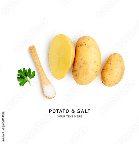 Raw new potatoes and salt creative layout isolated on white background.