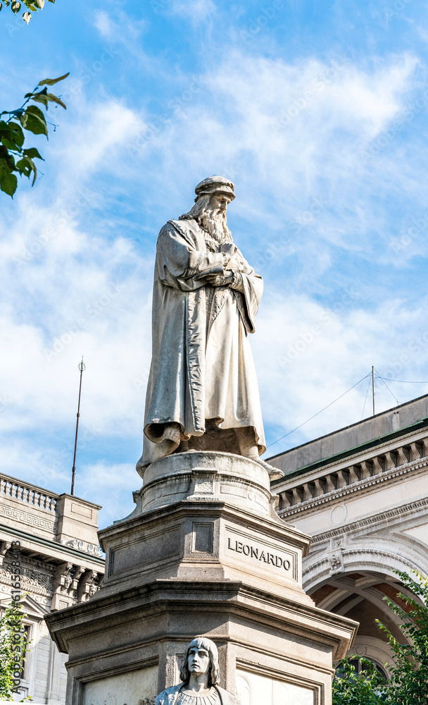 Statue of Leonardo da Vinci in Carrara Marble, erected in 1872 by Pietro Magni, in Piazza alla Scala, Milan city center, Lombardy region, Italy