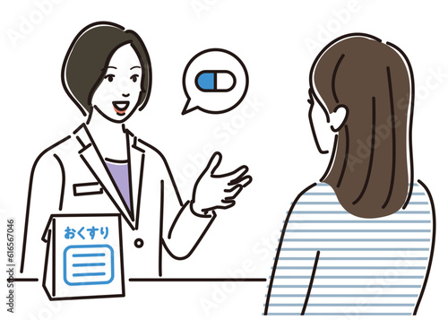 薬の説明をする薬剤師の女性