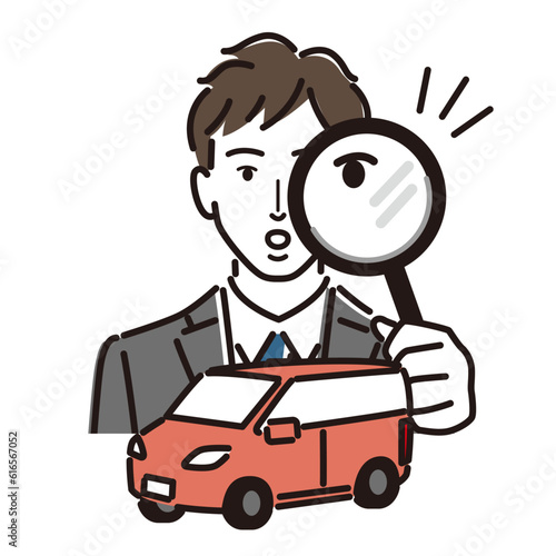 車と虫眼鏡を持つビジネスマン