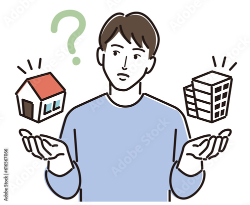 戸建とマンションを思い浮かべる男性