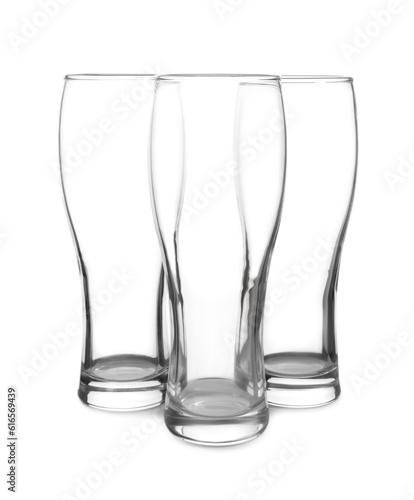 Elegant clean empty beer glasses isolated on white