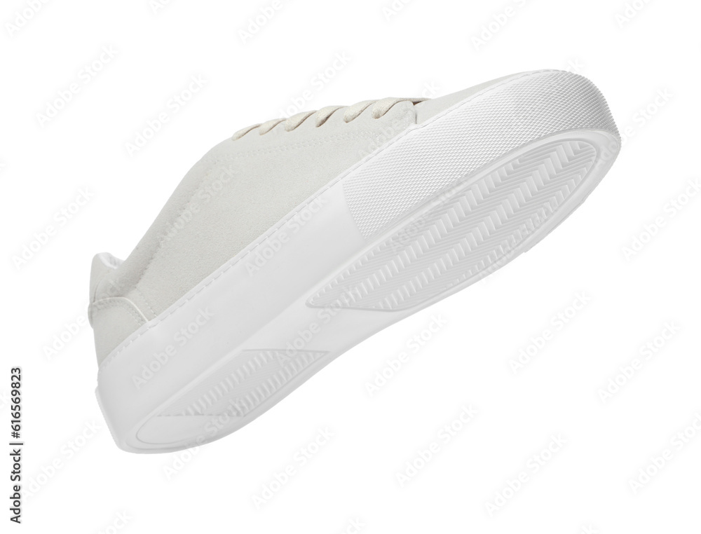 One stylish beige sneaker isolated on white One stylish beige sneaker isolated on white