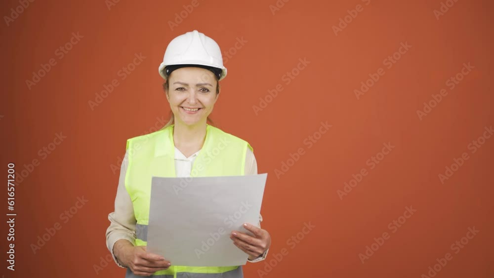The engineer holding the project laughs. The engineer holding the project laughs.