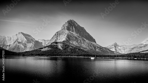 Black and White Landscape Photo of Swiftcurrent Lake and Grinnell Point in Glacier National Park in Montana, USA photo
