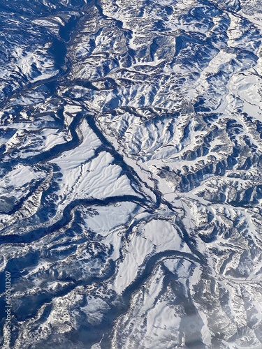aerial view of mountains with snow