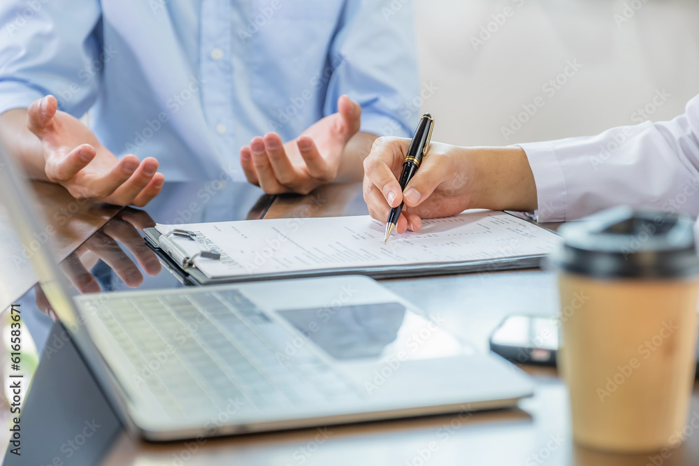 Doctor hand holding pen and explained examination results to the patient man, healthcare and medical checkup concept Doctor hand holding pen and explained examination results to the patient man, healthcare and medical checkup concept