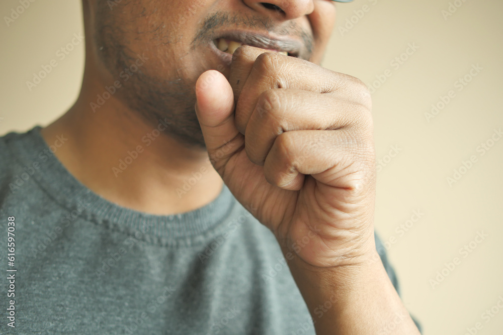 Fototapeta premium young sick man coughing and sneezes 
