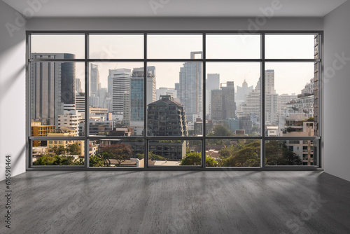 Empty room Interior Skyscrapers View Bangkok. Downtown City Skyline Buildings from High Rise Window. Beautiful Expensive Real Estate overlooking. Sunset. 3d rendering.