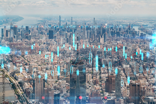 Aerial panoramic helicopter city view of Upper Manhattan  Midtown and Downtown  New York  USA. Forex candlestick graph hologram. The concept of internet trading  brokerage  analysis