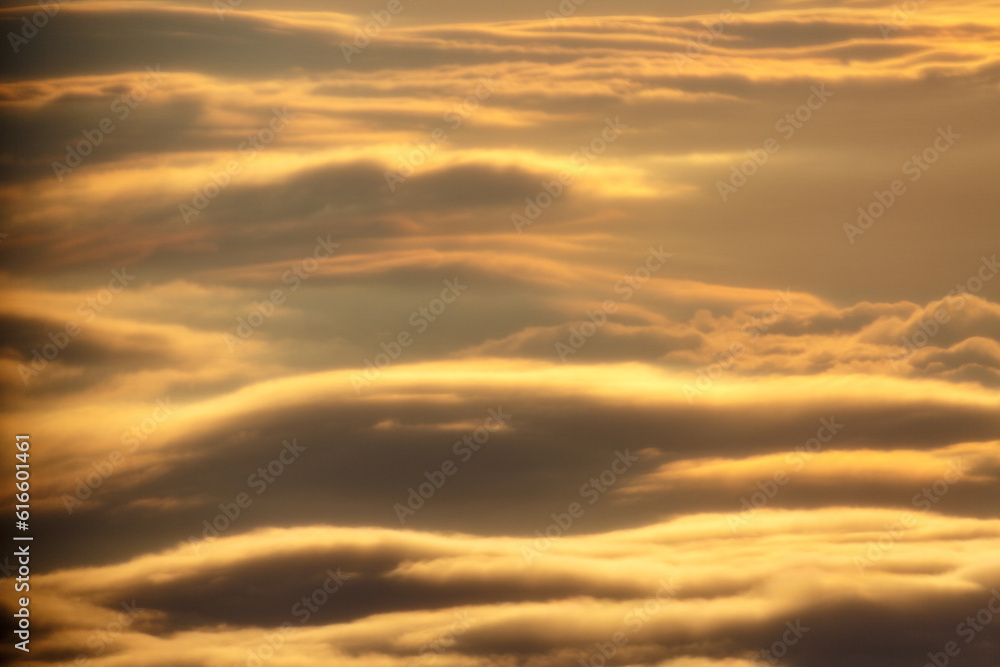 Obraz premium Abstract view to clouds from airplane on sunrise