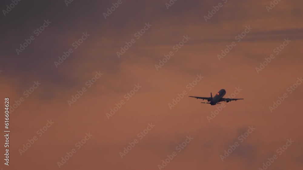Rear view, airplane take off at night. Passenger plane departure. Flight leaving. Runway lighting with landing lights. Rear view, airplane take off at night. Passenger plane departure. Flight leaving. Runway lighting with landing lights.
