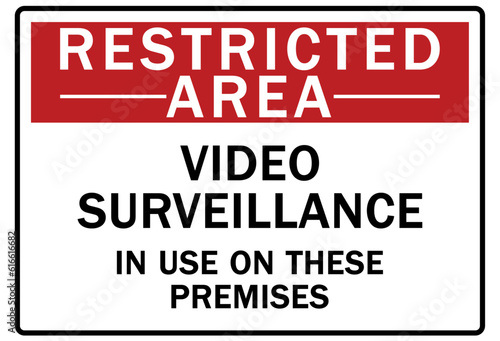 Restricted area warning sign and labels video surveillance in use on these premises