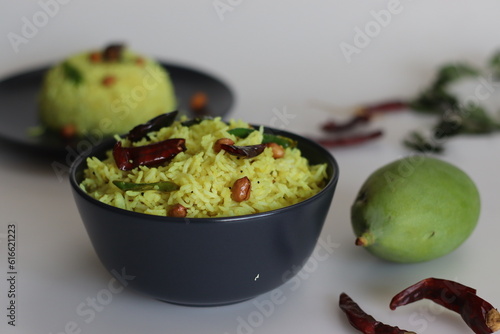 Raw mango rice shot on white background photo