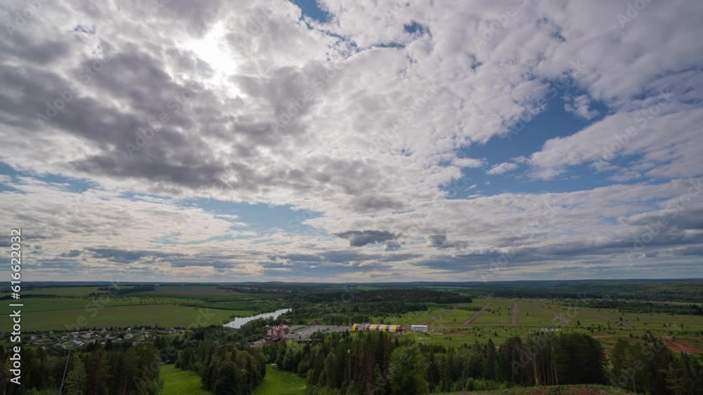 white clouds floating in the sky and beautiful landscape. Blue sky white clouds. Puffy fluffy white clouds. Cumulus cloud cloudscape timelapse. Summer blue sky time lapse. Nature weather blue sky white clouds floating in the sky and beautiful landscape. Blue sky white clouds. Puffy fluffy white clouds. Cumulus cloud cloudscape timelapse. Summer blue sky time lapse. Nature weather blue sky