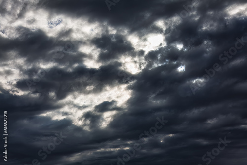 The sky is filled with dark clouds. Cloudscape has been developing in gorgeous form. 
