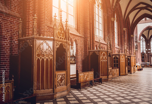 Billede på lærred Row of confessionals booth of old european catholic church.