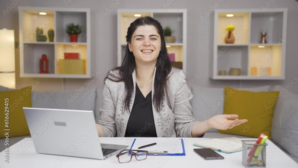 Home office worker woman says come to camera, calling you. Home office worker woman says come to camera, calling you.