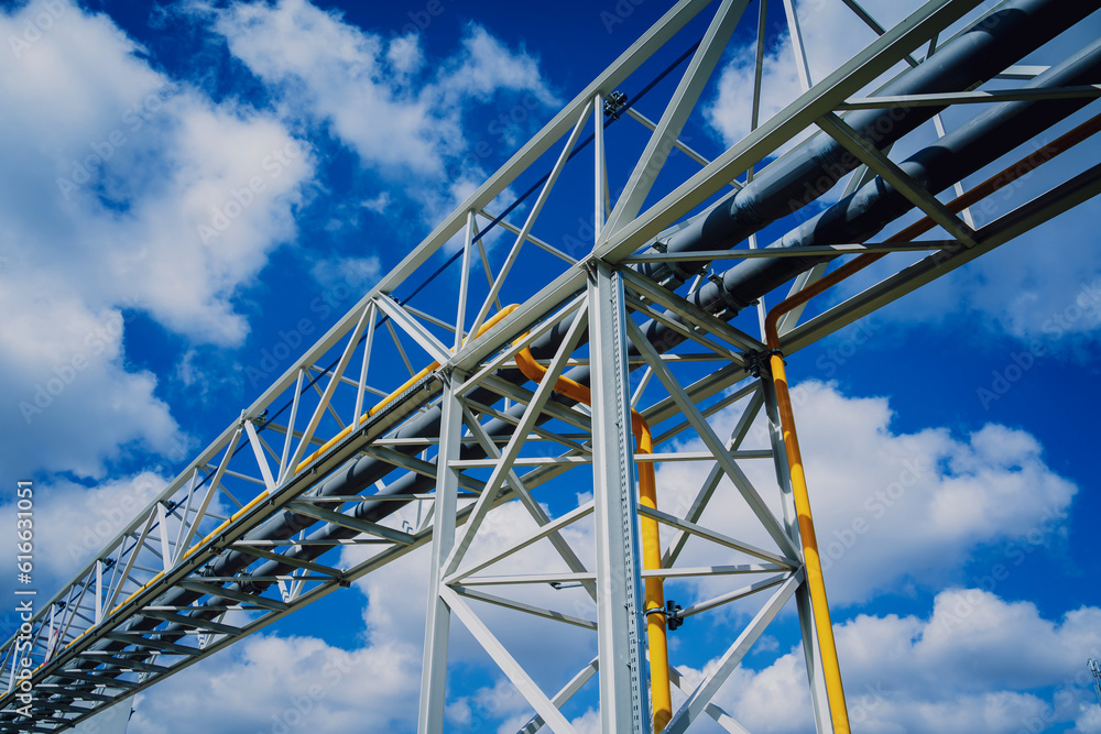 Modern steam pipeline for industrial on blue skies background. Modern steam pipeline for industrial on blue skies background.