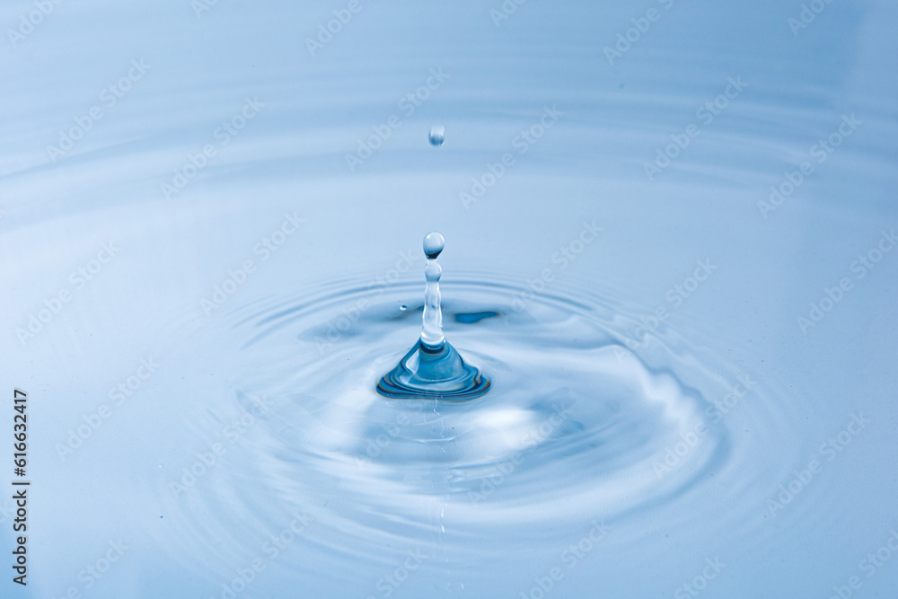 falling of a drop of water,water Droplets and splatters background. falling of a drop of water,water Droplets and splatters background.