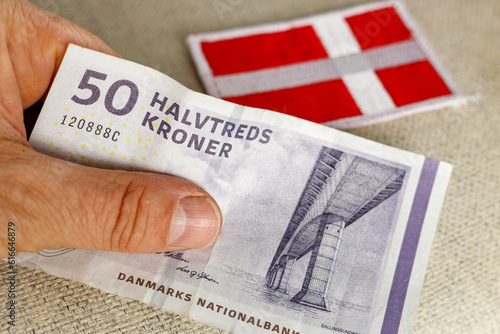 Denmark Money, 50 danish kroner banknote together with national flag, Financial and business concept