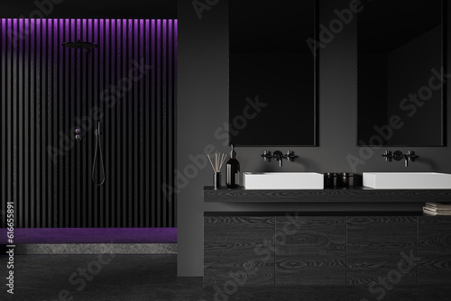 Black bathroom interior with sink  mirror and douche  bathing accessories