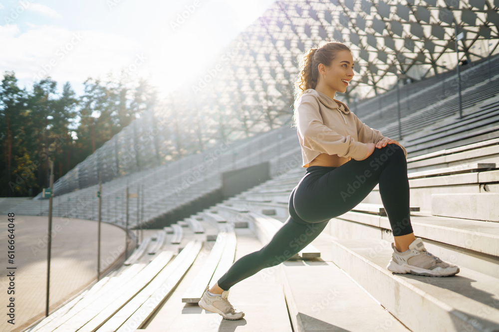 Sport woman doing exercises outdoors in the morning. Sport, Active life, sports training, healthy lifestyle. Sport woman doing exercises outdoors in the morning. Sport, Active life, sports training, healthy lifestyle.