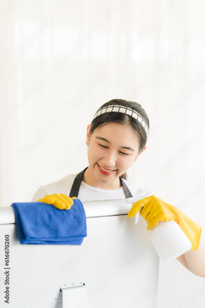 Close up view of person cleaning computer keyboard using tablecloth cleaning concept Close up view of person cleaning computer keyboard using tablecloth cleaning concept
