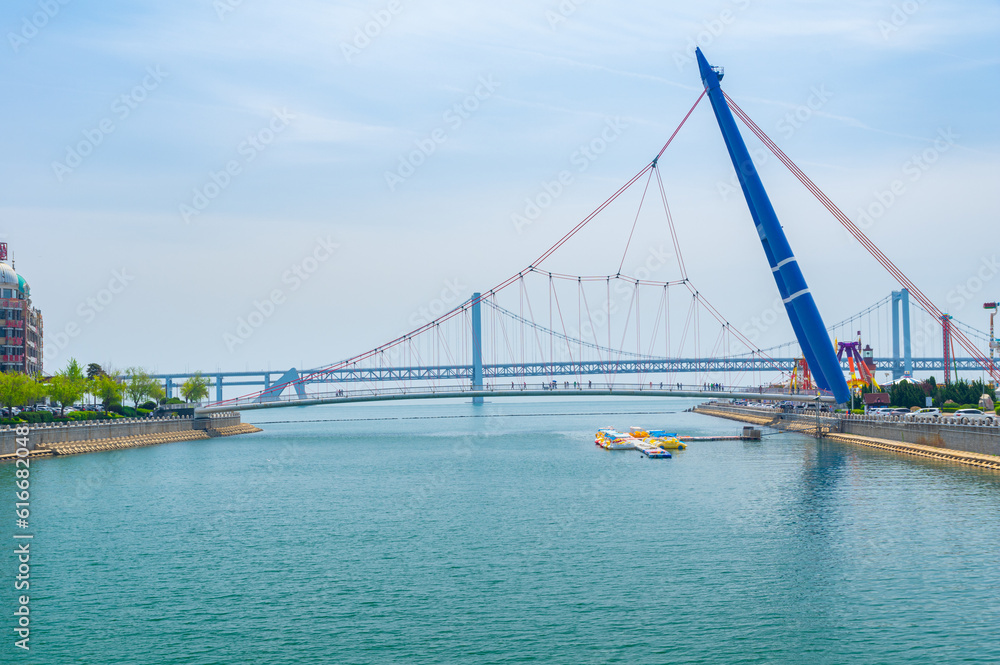 Fototapeta premium Spring seaside scenery of Binhai Road in Dalian, Liaoning province, China