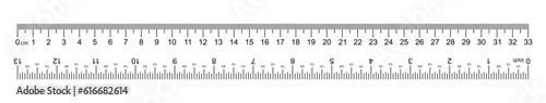 A white ruler marked with centimeters, inches and combined rectangular shapes. Output inch line. Vector graphics on a white background.
