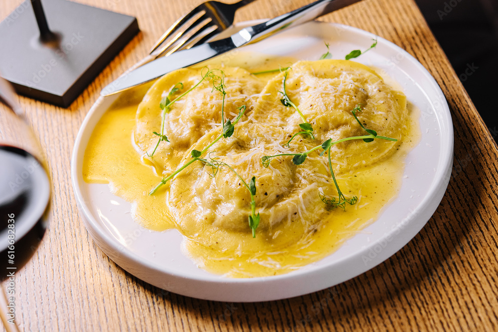 Italian ravioli with glass of wine Italian ravioli with glass of wine