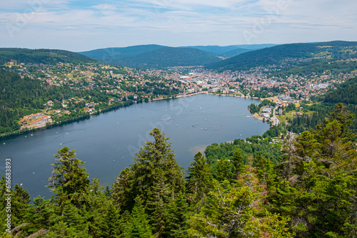 aerial view to the village of Gerardmer with lake and sailing boats © travelview