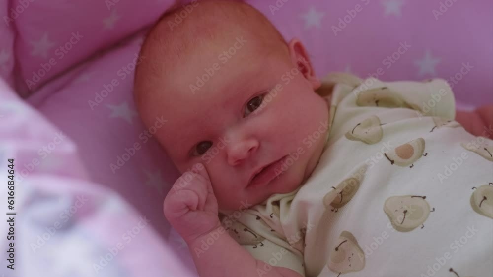 Portrait of adorable baby newborn lying on the bed Portrait of adorable baby newborn lying on the bed