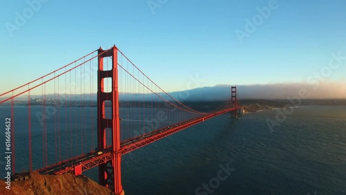 Wallpaper Mural Aerial Shot Of People Near Famous Golden Gate Bridge On Sea, Drone Flying Forward Over Landmark Near Mountains Against Sky - San Francisco, California Torontodigital.ca