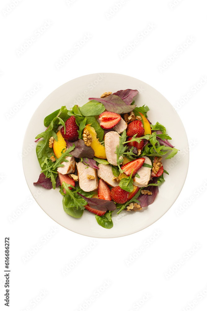 Salad with chicken, mango, strawberries and green leaves on a white background Salad with chicken, mango, strawberries and green leaves on a white background
