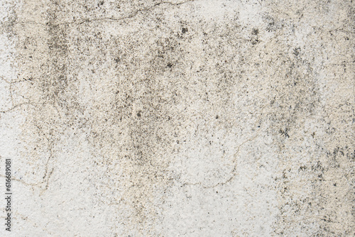 Old cement wall background, faded color