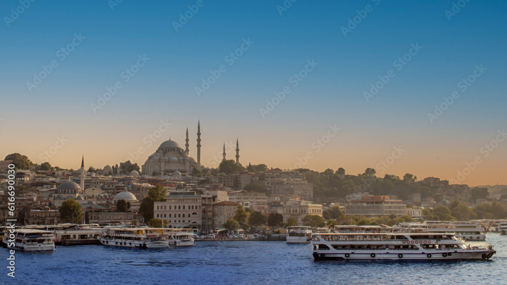 Eminonu Harbor with Fatih Mosque, Istanbul Turkey . Travel concept and sea front view