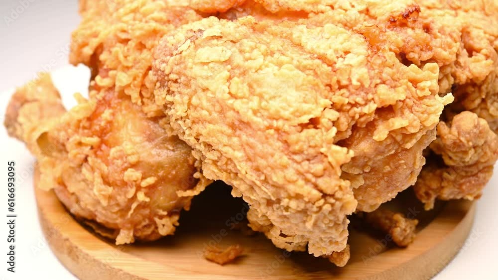 angle view deep fried chicken rotating at horizontal composition angle view deep fried chicken rotating at horizontal composition
