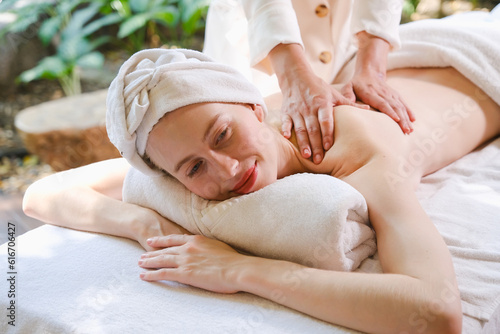 caucasian white woman relaxing in spa massage