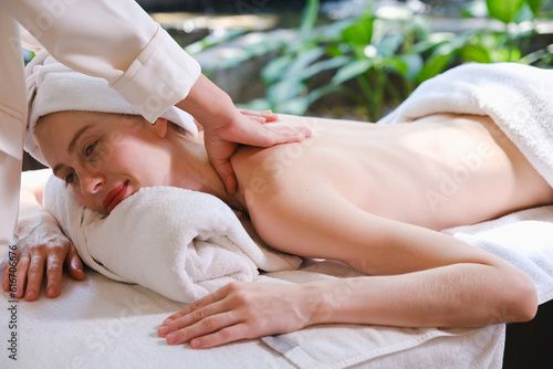 caucasian white woman relaxing in spa massage