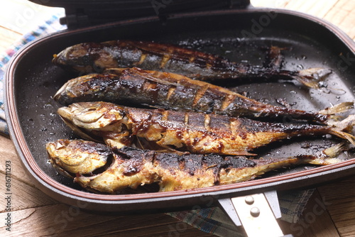 Teflon grilled skipjack. fish baked in a teflon-coated pan. Ikan cakalang bakar. Indonesian food. 

 photo