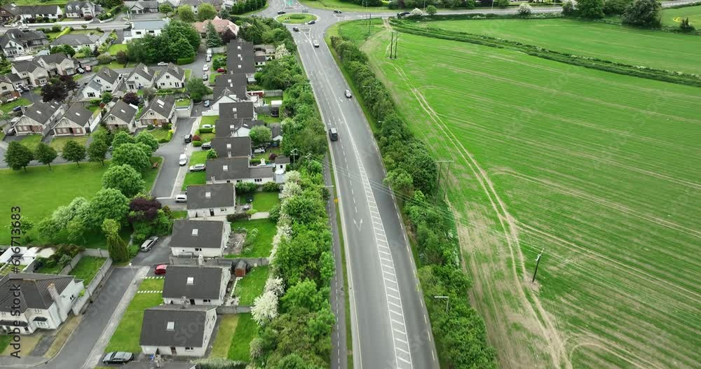 Flying over a city road in a small town 4k Flying over a city road in a small town 4k