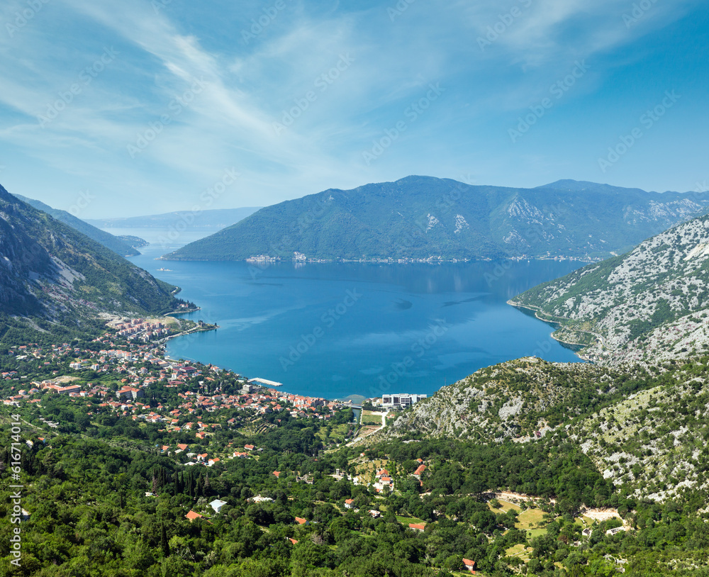 Bay of Kotor summer misty view from up and Kotor town on coast  (Montenegro)