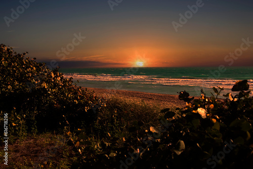 Sun Setting On Miami Beach, Golden Hightlights, Florida photo