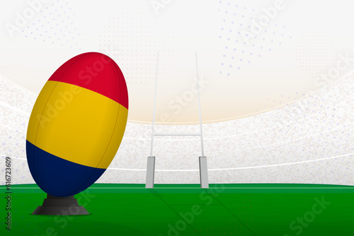 Chad national team rugby ball on rugby stadium and goal posts  preparing for a penalty or free kick.