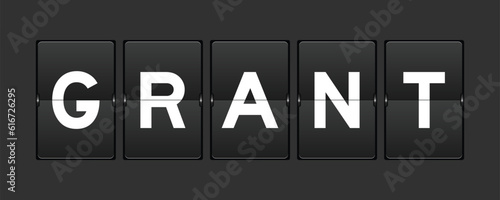 Black color analog flip board with word grant on gray background