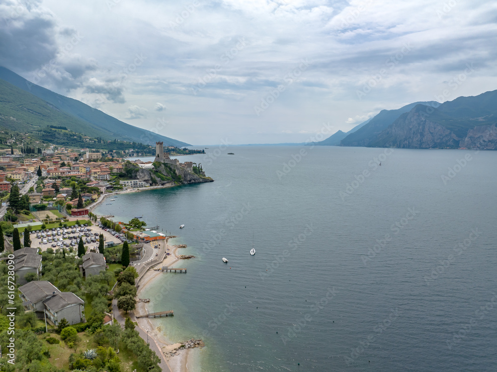 Italy - Amazing Garda lake at cloudy weather from drone view