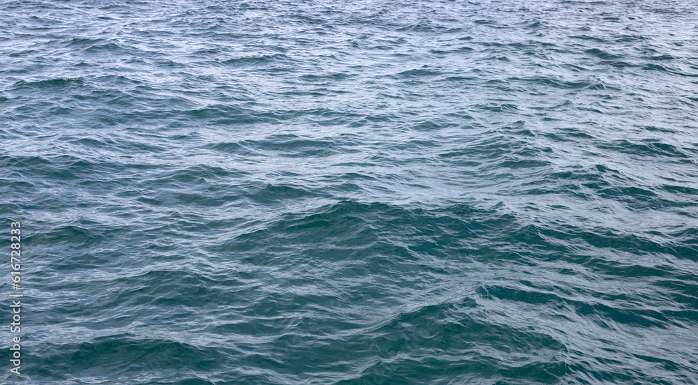 Blue sea water surface texture. Blue ocean summer Blue sea water surface texture. Blue ocean summer
