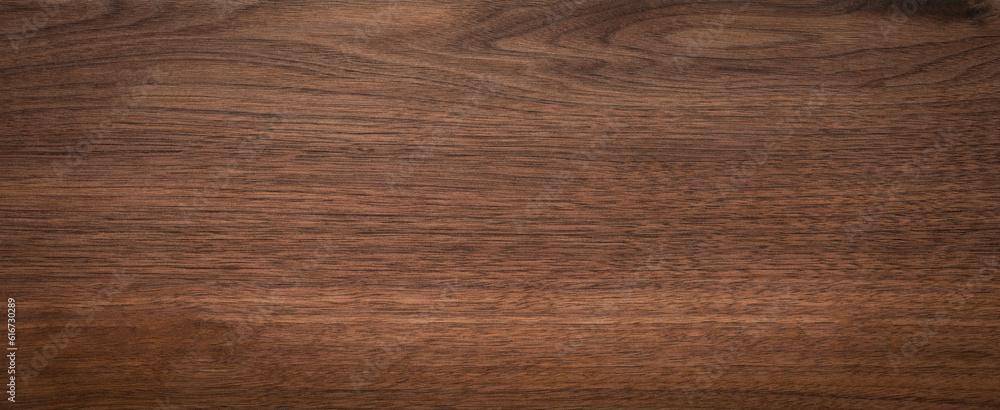 Walnut wood texture background. Walnut plank top. Walnut wood texture background. Walnut plank top.